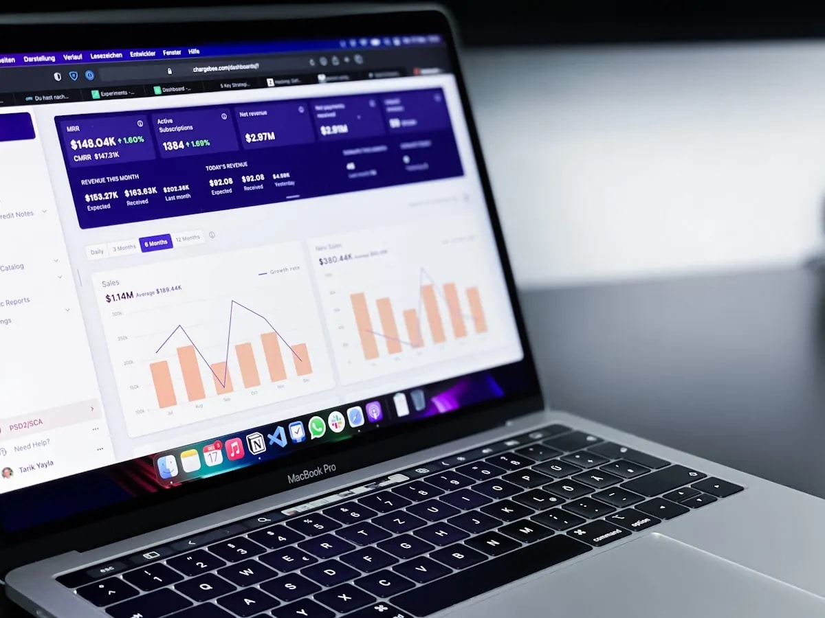 Laptop displaying workforce analytics data used for AI-driven productivity decisions